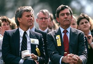 News anchors Tom Brokaw and Dan Rather at a 1990 vigil in Washington. Photograph by Dirck Halstead. Dirck Halstead Photographic Archive, Briscoe Center for American History, The University of Texas at Austin.